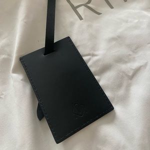 RIMOWA suitcase tag